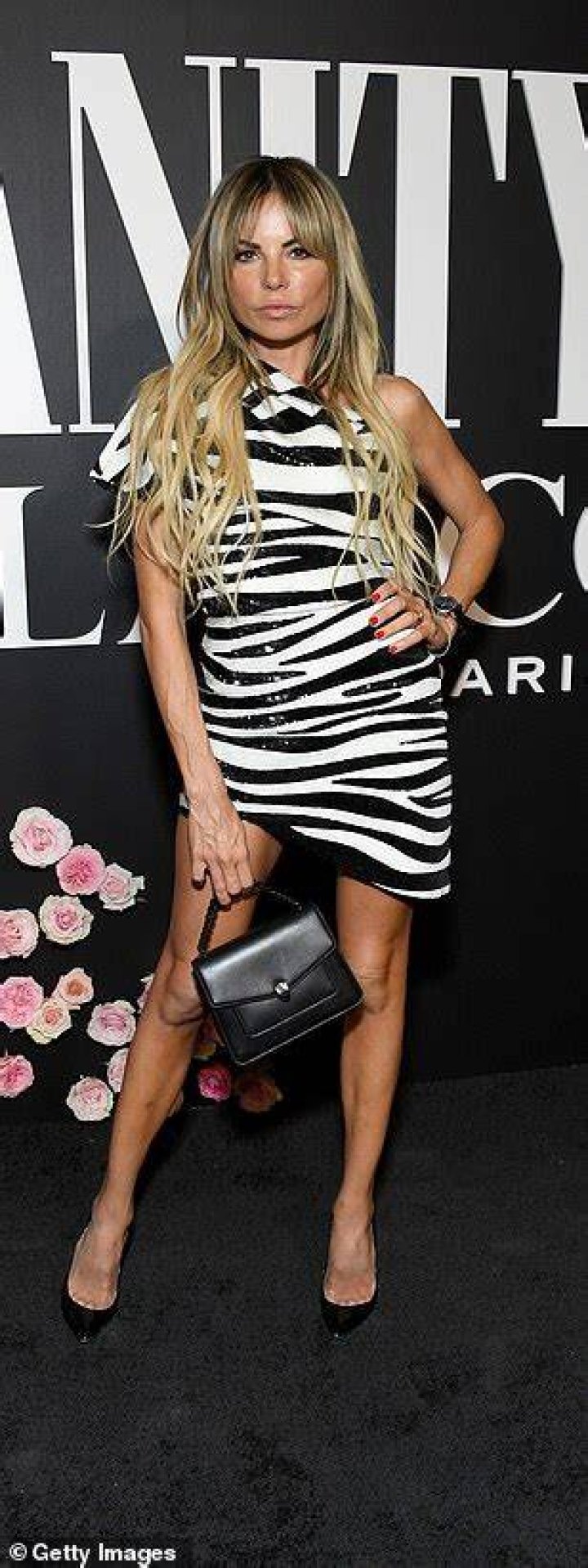 Wow!&nbsp;Erica Pelosini looked good in a zebra print dress